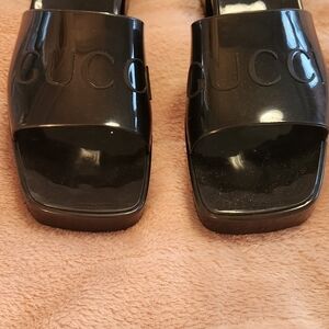 Gucci Glossy Black Embossed Mules